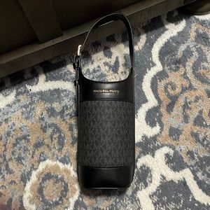 Michael Kors black wine bottle holder.